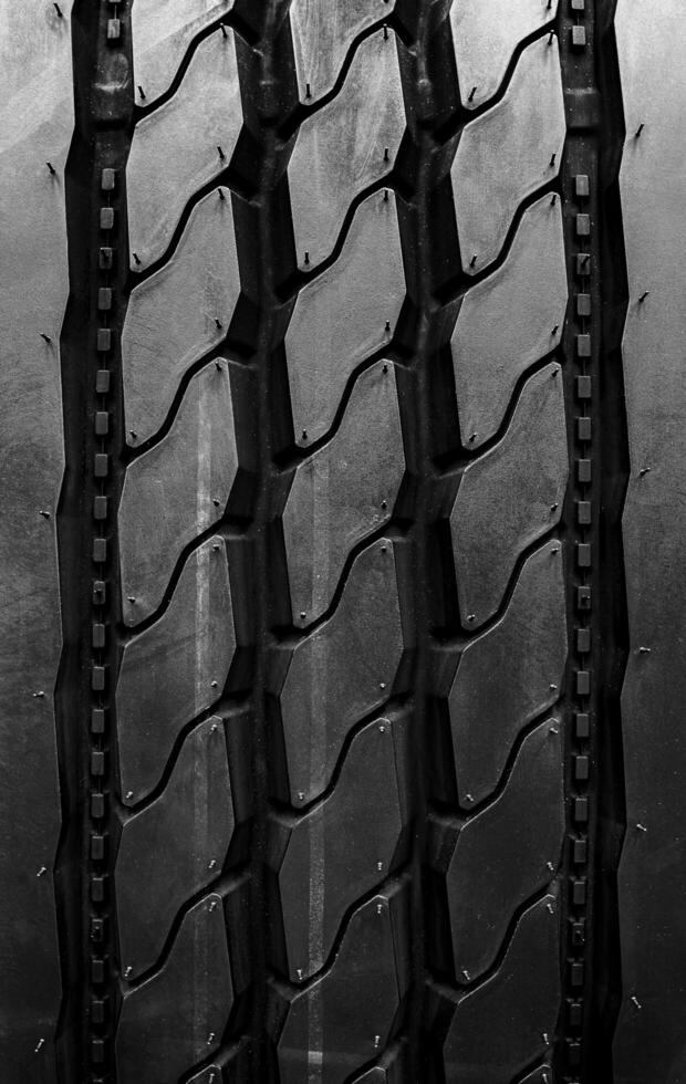 Texture on road tire tread background photo