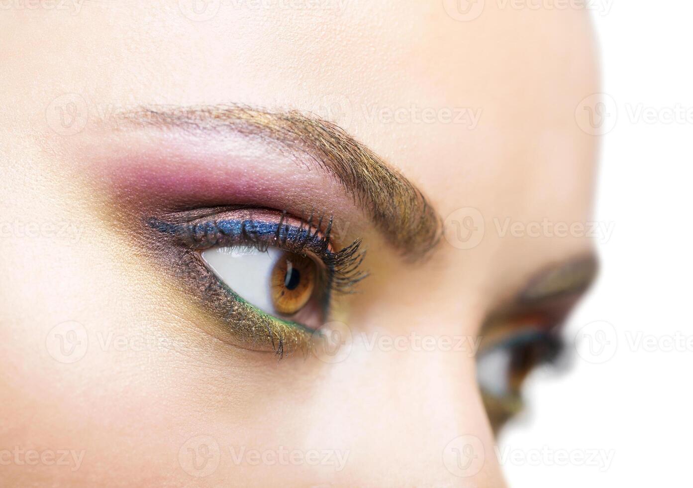 Close up portrait of a beautiful young model with bright make up photo