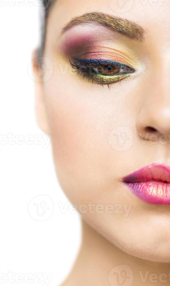Close up portrait of a beautiful young model with bright make up photo