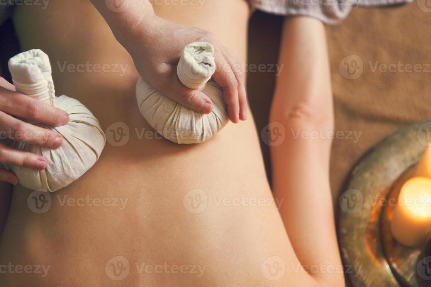 Portrait of young beautiful woman in spa photo