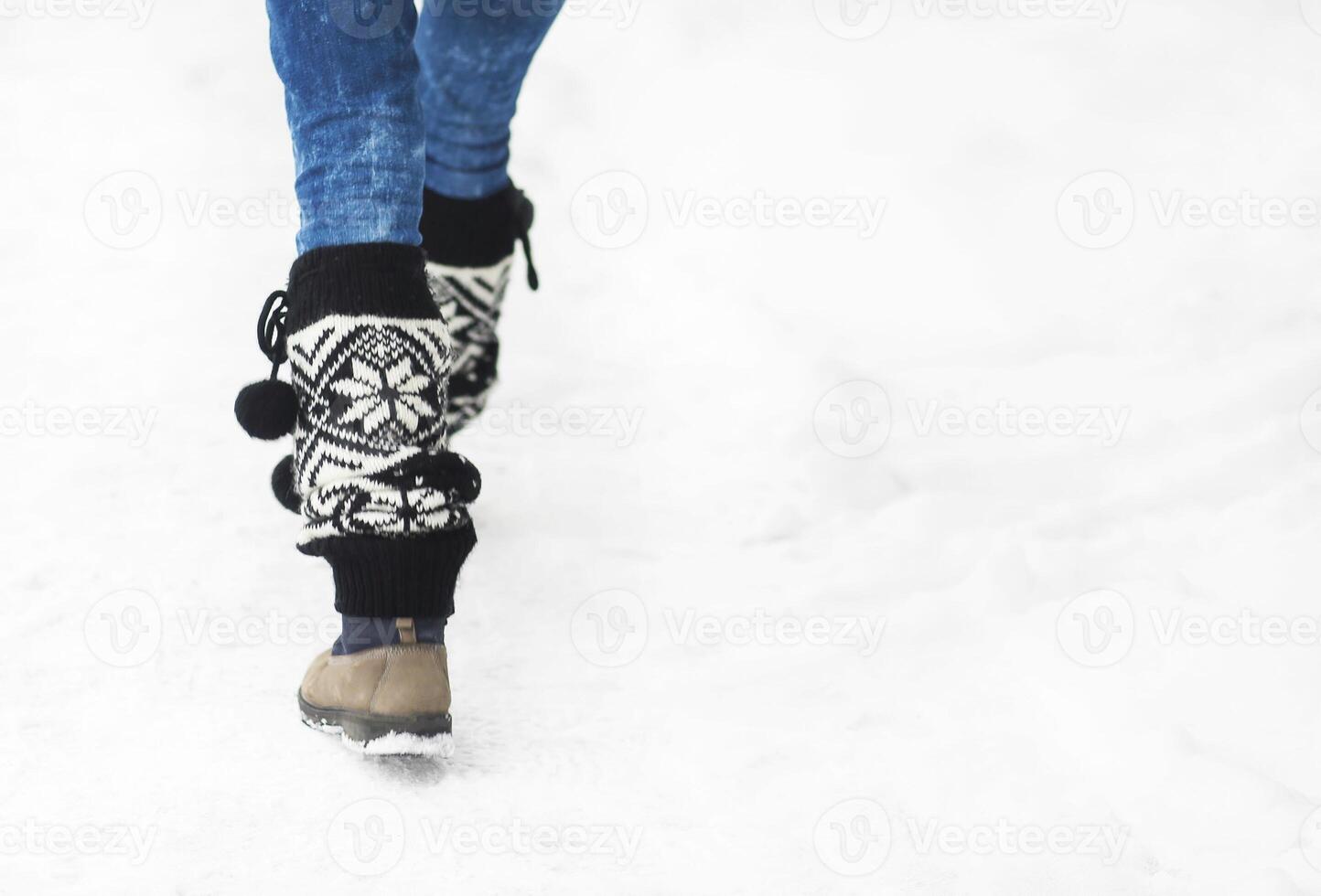 Woman walking in winter park. Close up photo