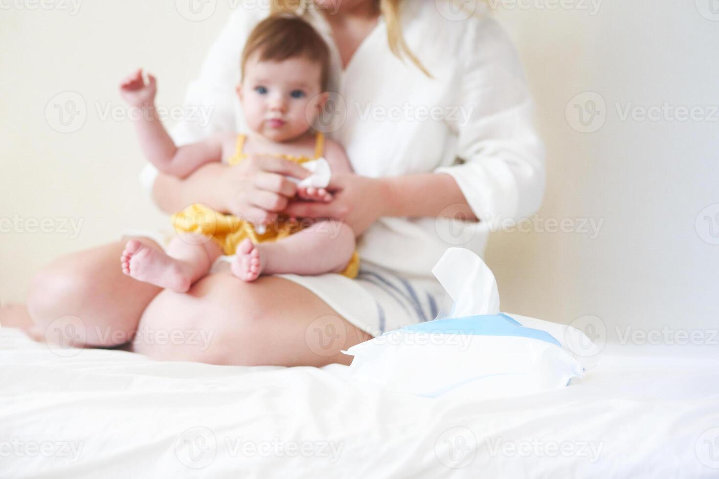 Young woman in the morning with small girl photo