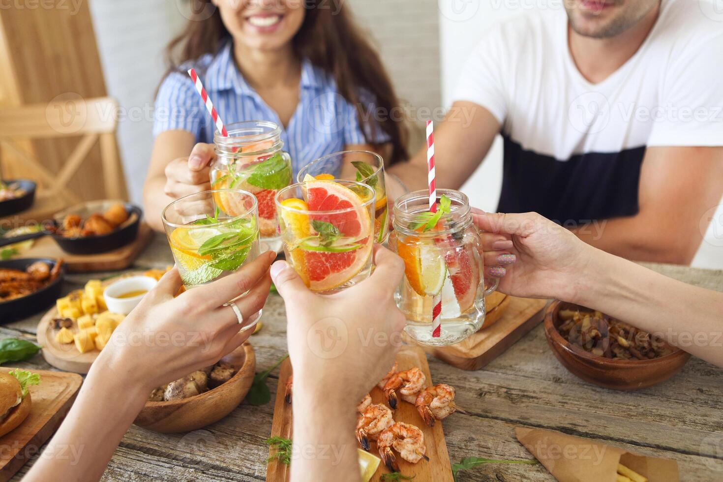 Hands with soft drink, lemonade photo