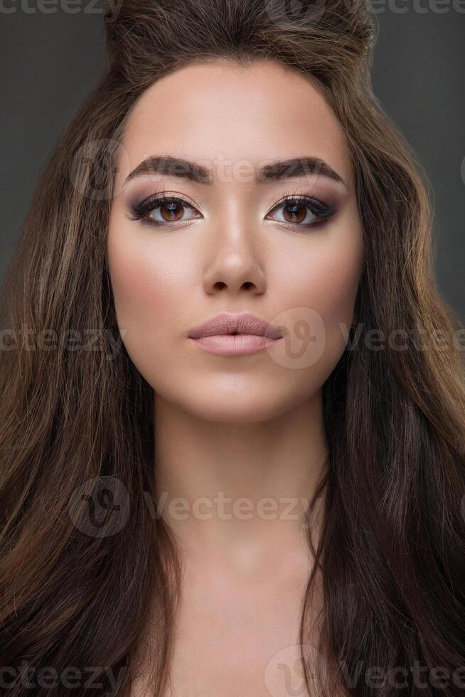 Portrait of a amazing beautiful brunette woman photo