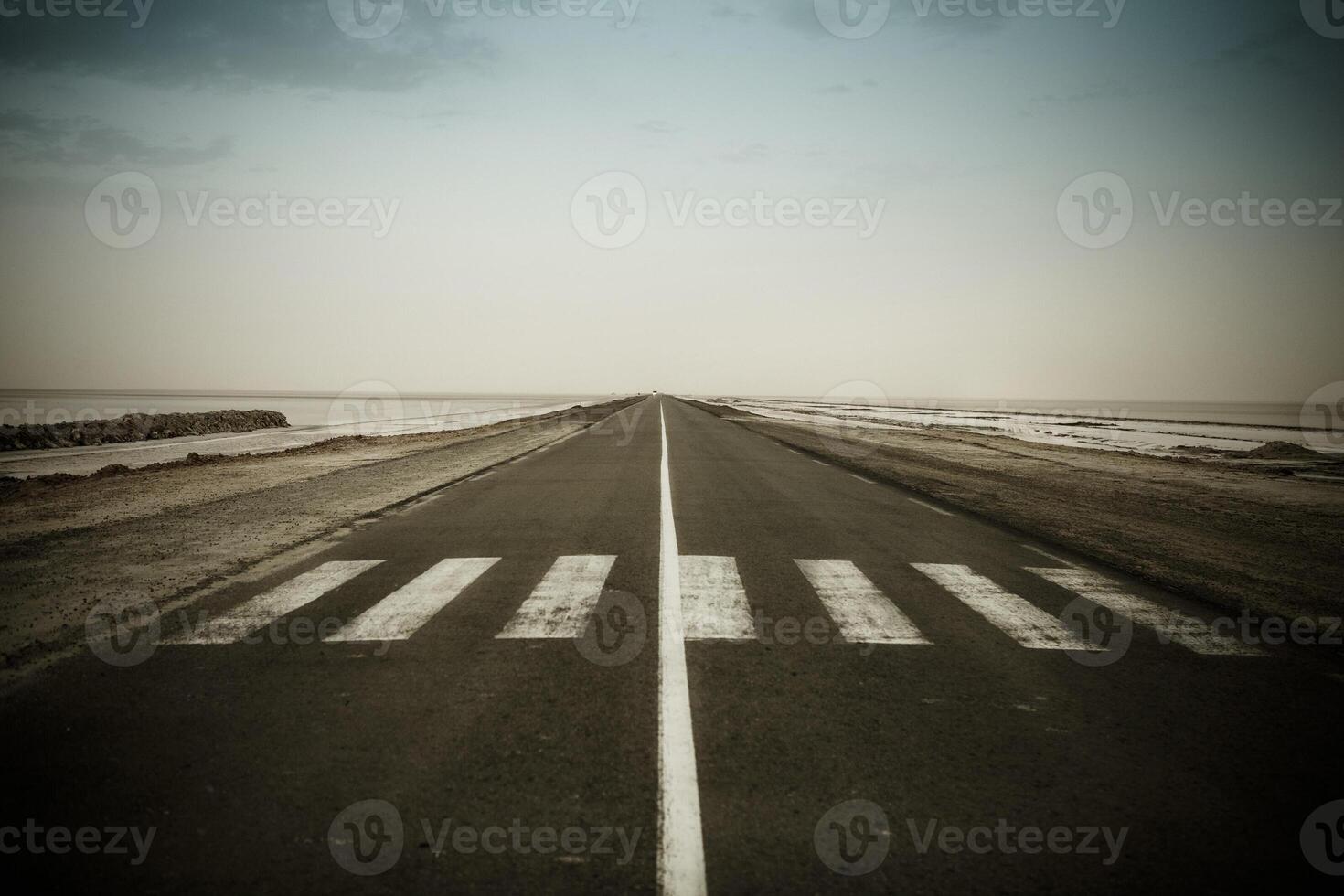 Empty dark road near the CHOTT EL JERID photo