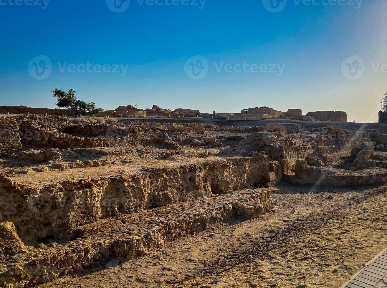 Ruines of ancient village in Qalat al-Bahrain - Bahrain fort photo