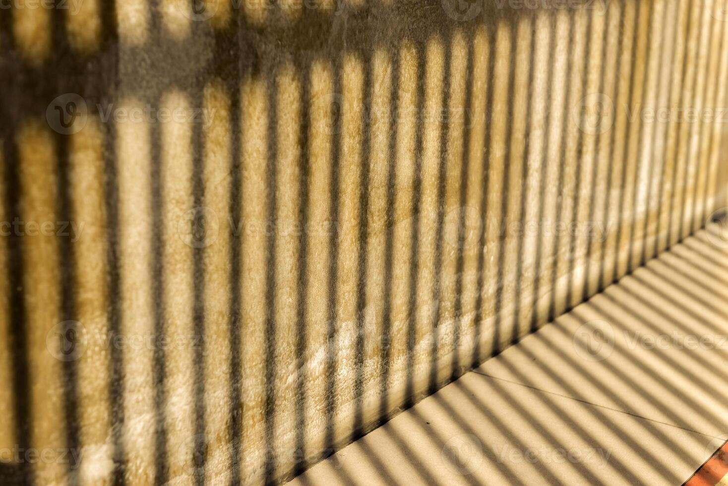 Abstract light and shadow of architecture detail on concrete wall photo