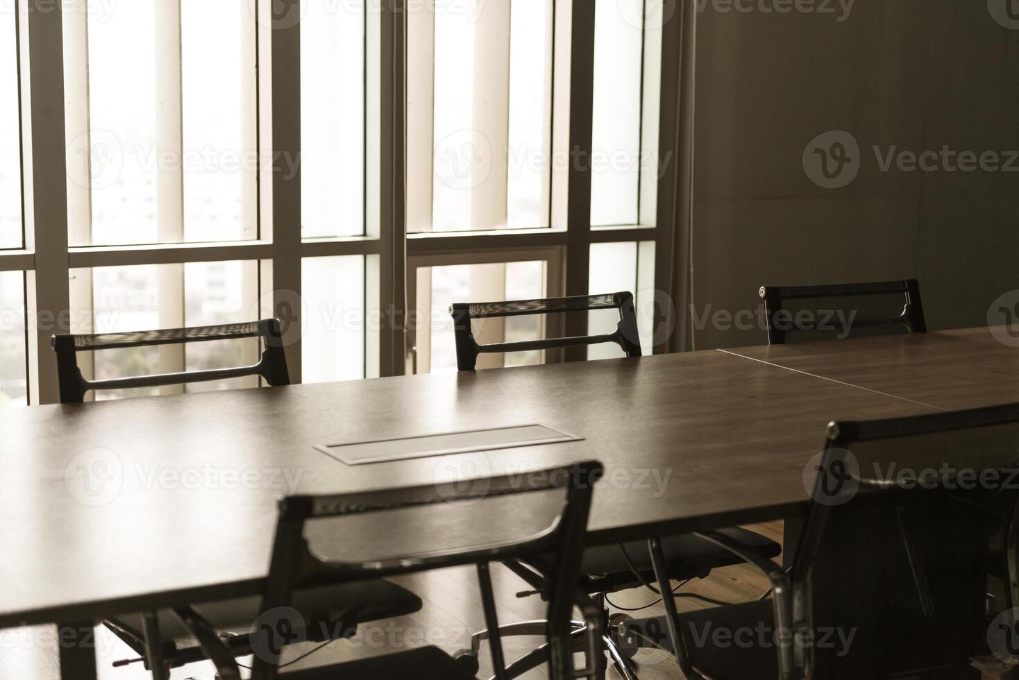 Table and chairs in office meeting room. empty conference room. photo