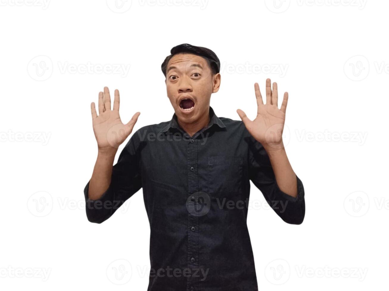 Young asian man holding mobile phone surprised in casual shirt showing copy space on palm isolated on white background. Good offer concept photo