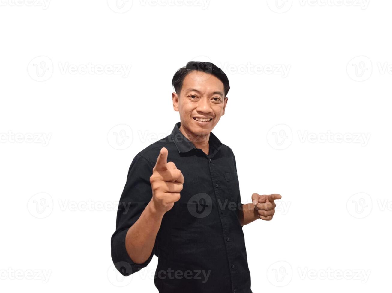 Shocked young Asian man in casual shirt pointing finger aside at copy space isolated on white background. Great offer concept photo