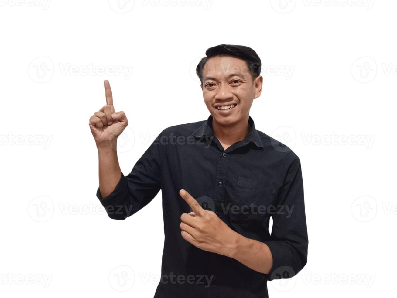 Shocked young Asian man in casual shirt pointing finger aside at copy space isolated on white background. Great offer concept photo