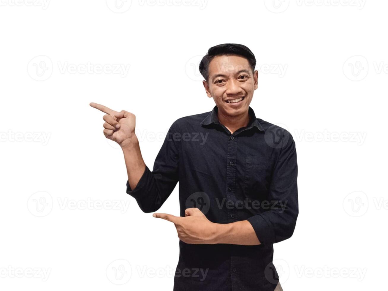 Shocked young Asian man in casual shirt pointing finger aside at copy space isolated on white background. Great offer concept photo