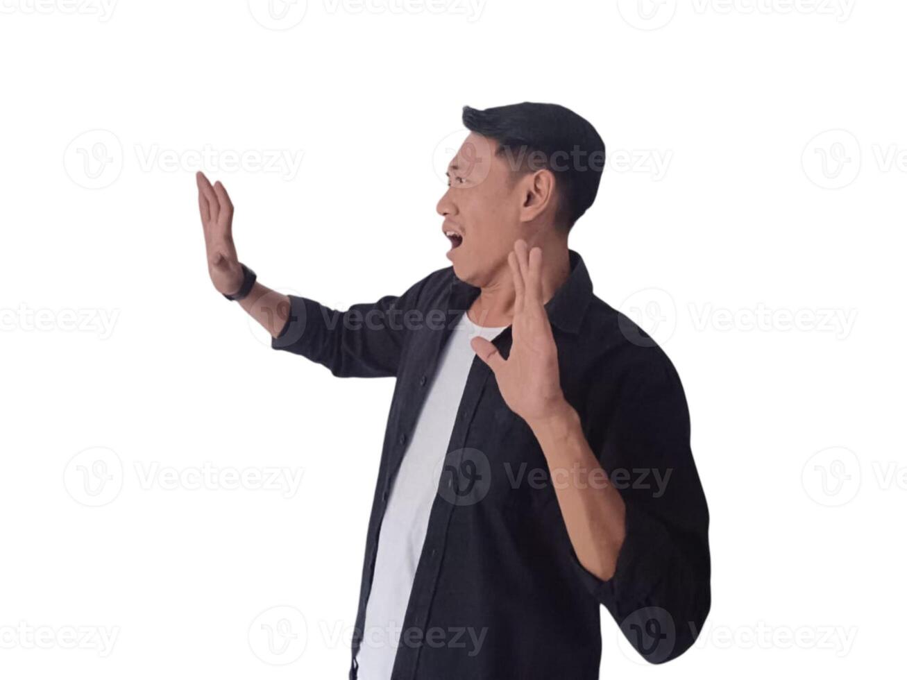 Young asian man holding mobile phone surprised in casual shirt showing copy space on palm isolated on white background. Good offer concept photo