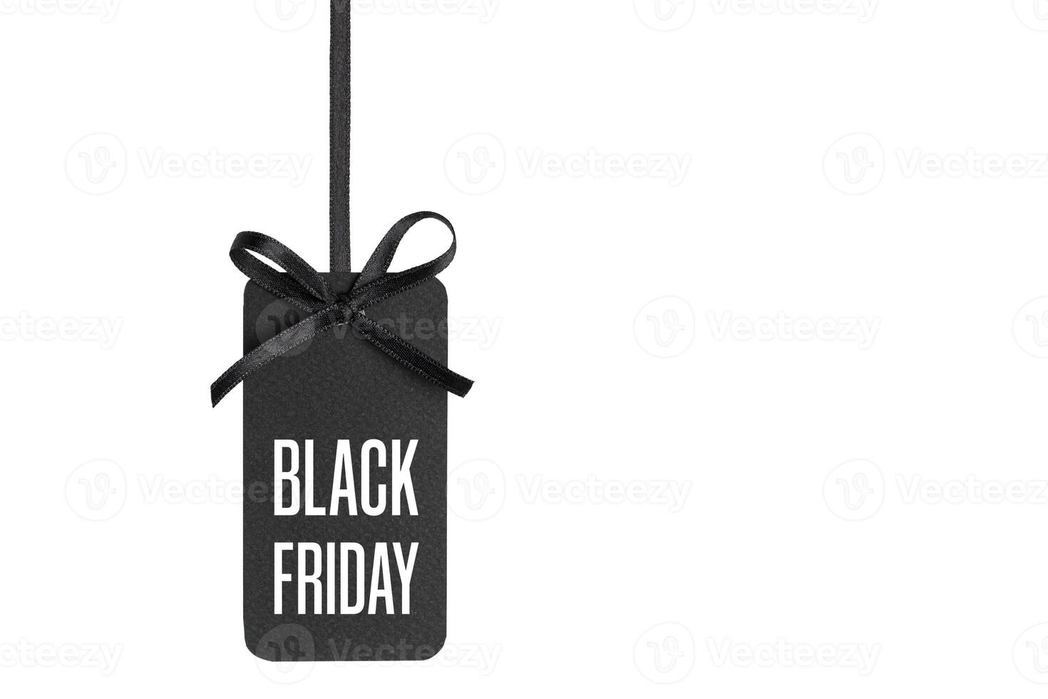 Sale tag with Black Friday written on white photo