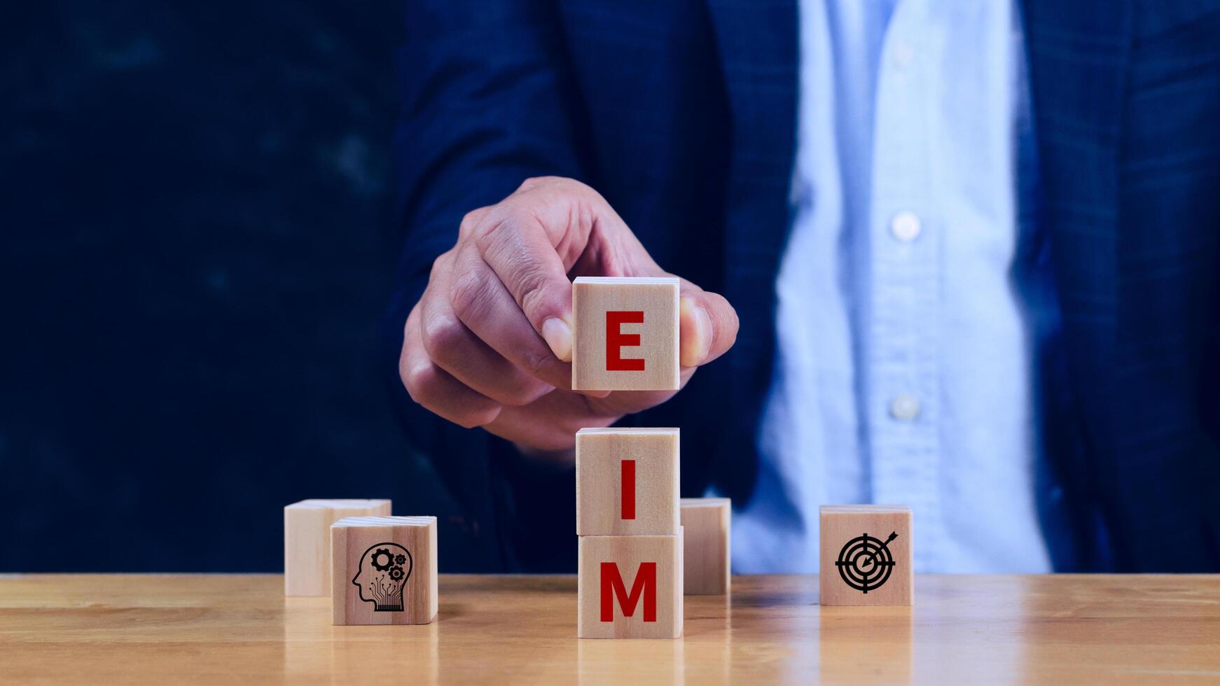EIM Enterprise information management system on wooden cubes, EIM Global Network with Analyzing Technological Data, Efficient Information Management. photo