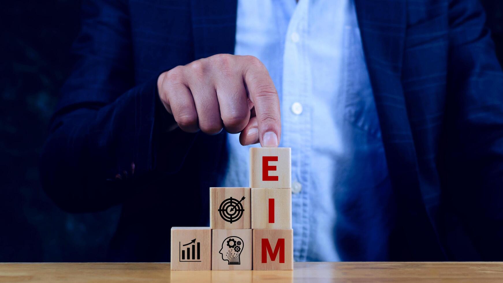 EIM Enterprise information management system on wooden cubes, EIM Global Network with Analyzing Technological Data, Efficient Information Management. photo