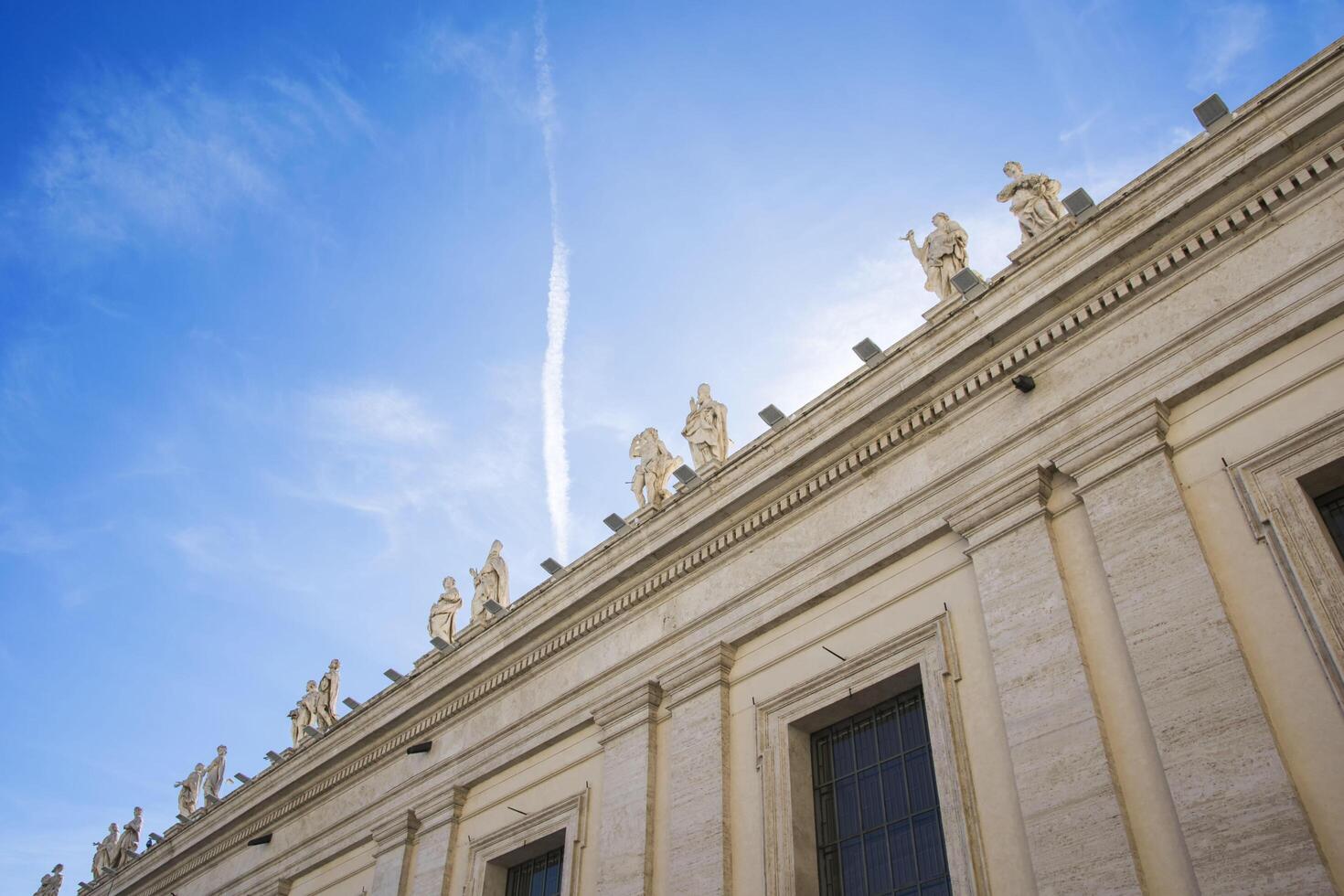 St. Peters Basilica, Statues on Saint Peter's basilica, Empty Saint Peter's square photo