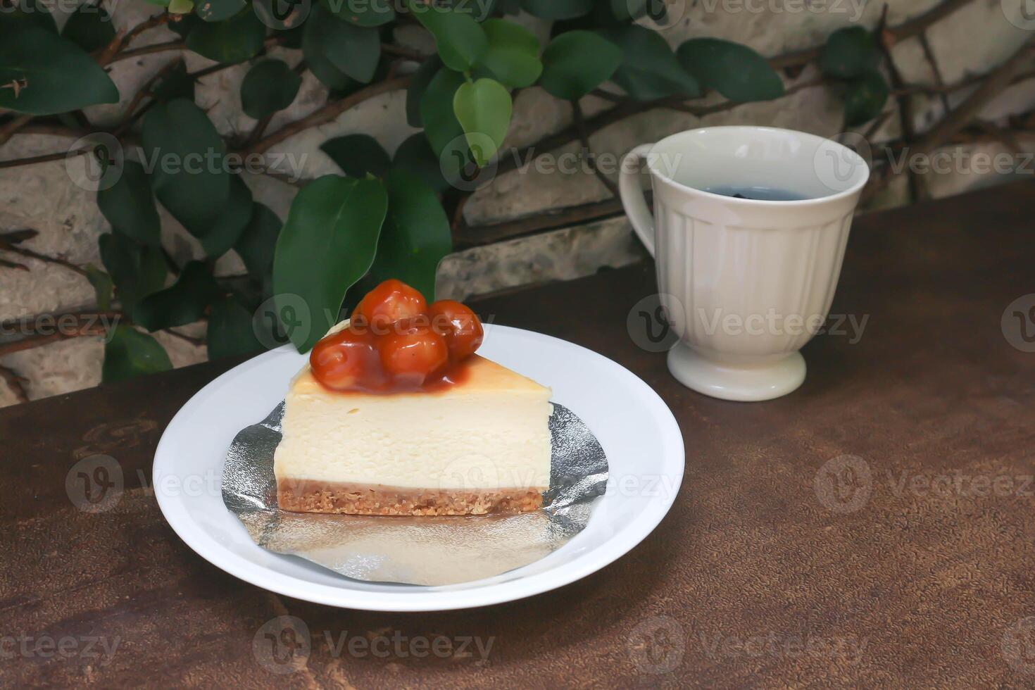 caramel macadamia cheesecake or nut cake,macadamia cake or Macadamia Nut cake or caramel cake and butterfly pea tea photo