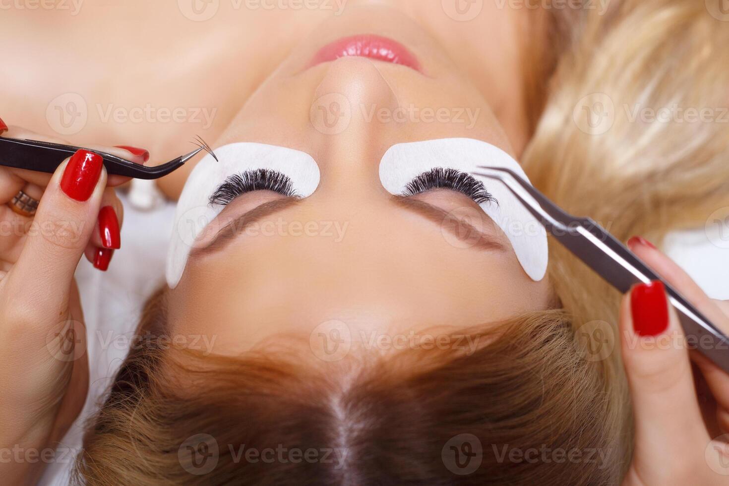 Woman Eye with Long Eyelashes. Eyelash Extension. Lashes, close up, selected focus. photo