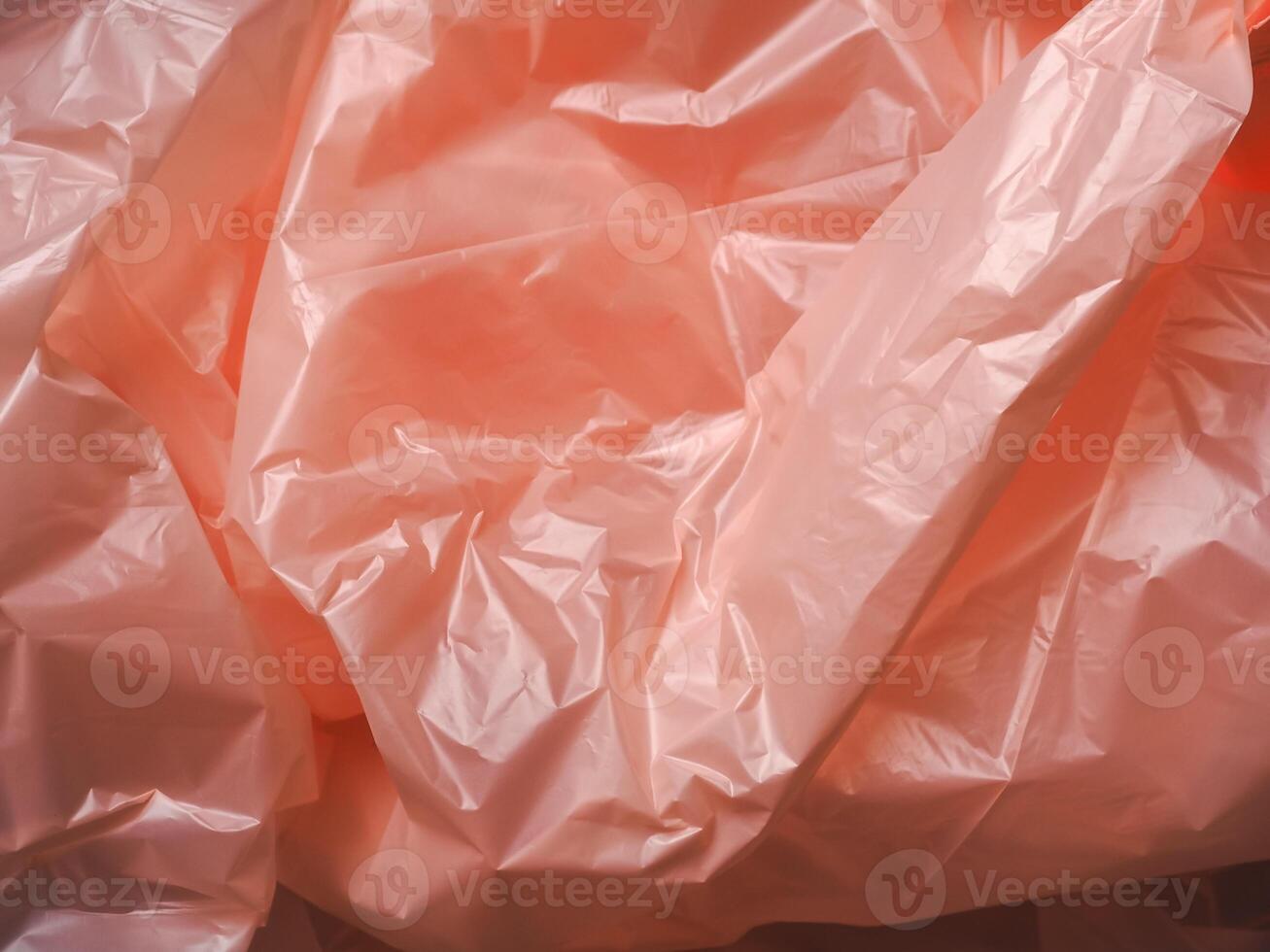 Old rose colored plastic bag texture for abstract background. photo