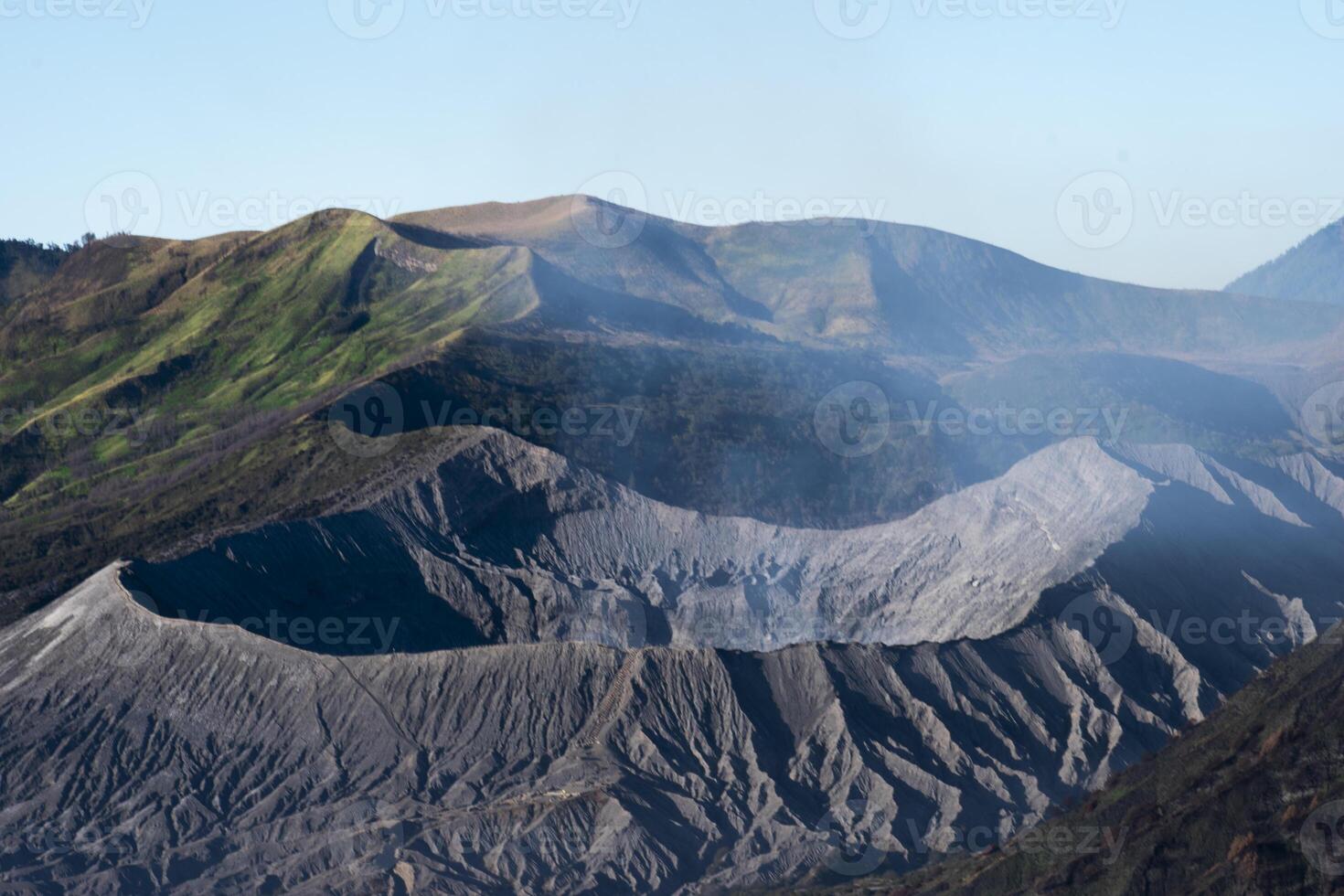 The crater rim of Mount Bromo, an active volcano located in the Bromo Tengger Semeru National Park area, East Java, Indonesia. photo