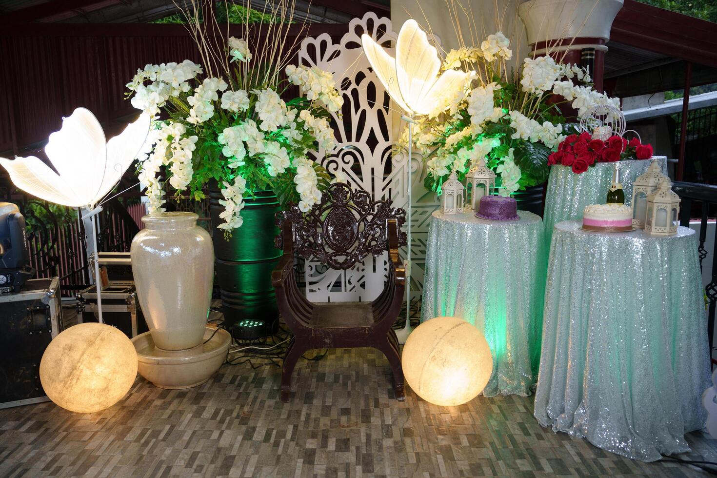 a wedding reception with a large table and chairs photo
