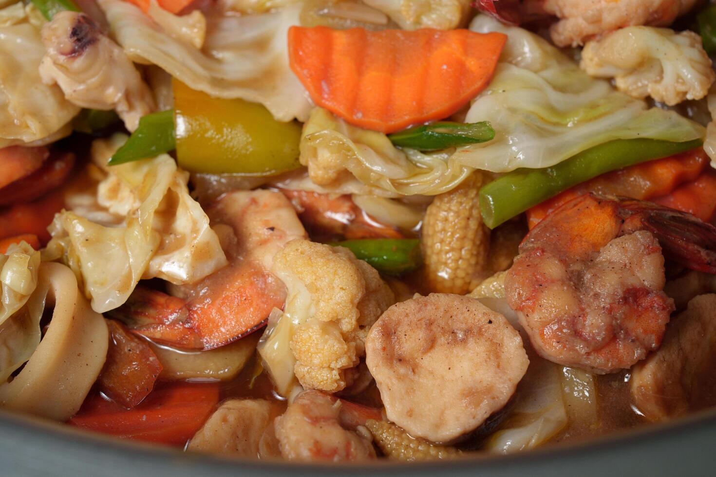 a bowl of food with vegetables and meat photo