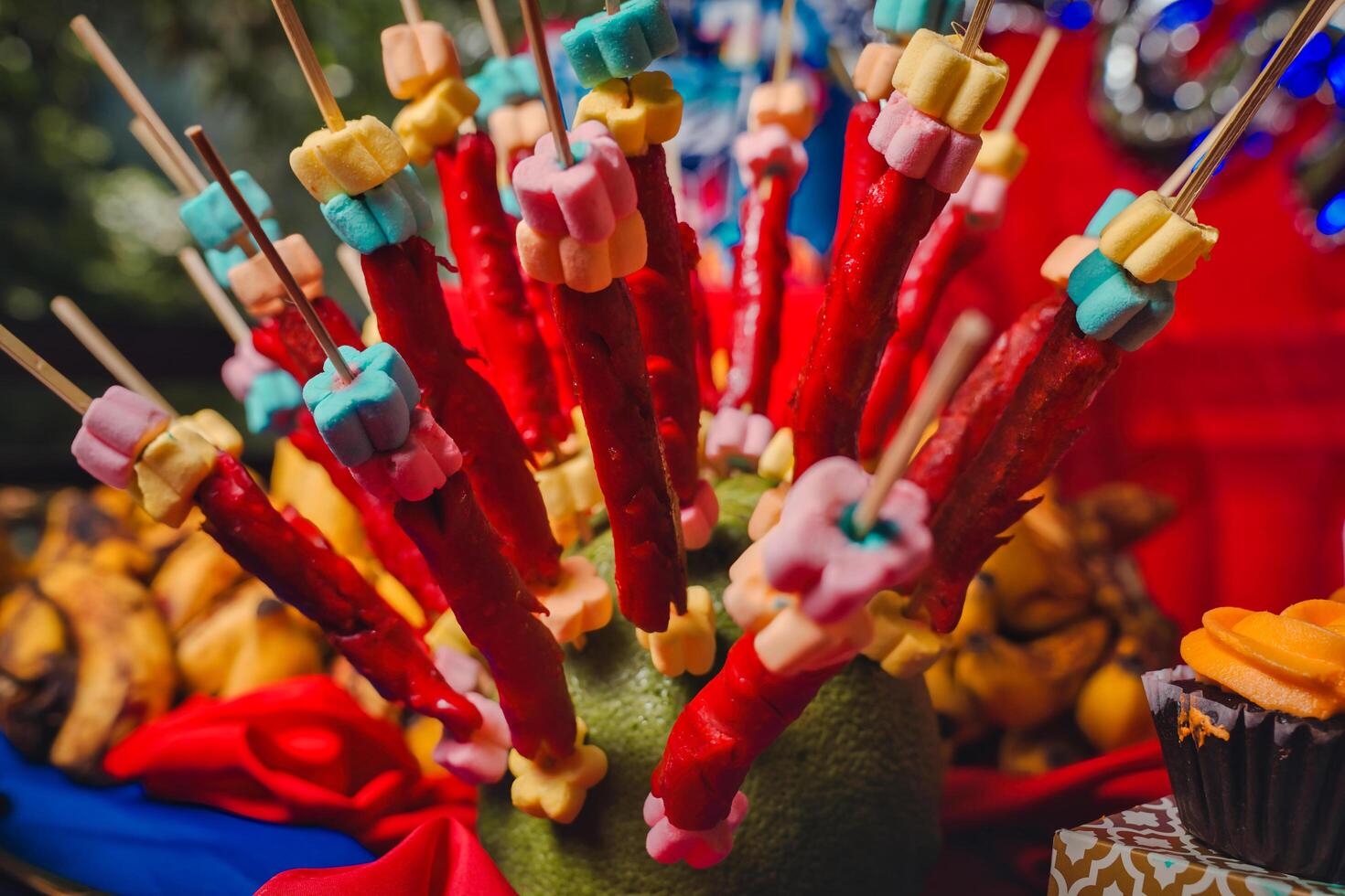 A bunch of colorful sticks on a table photo