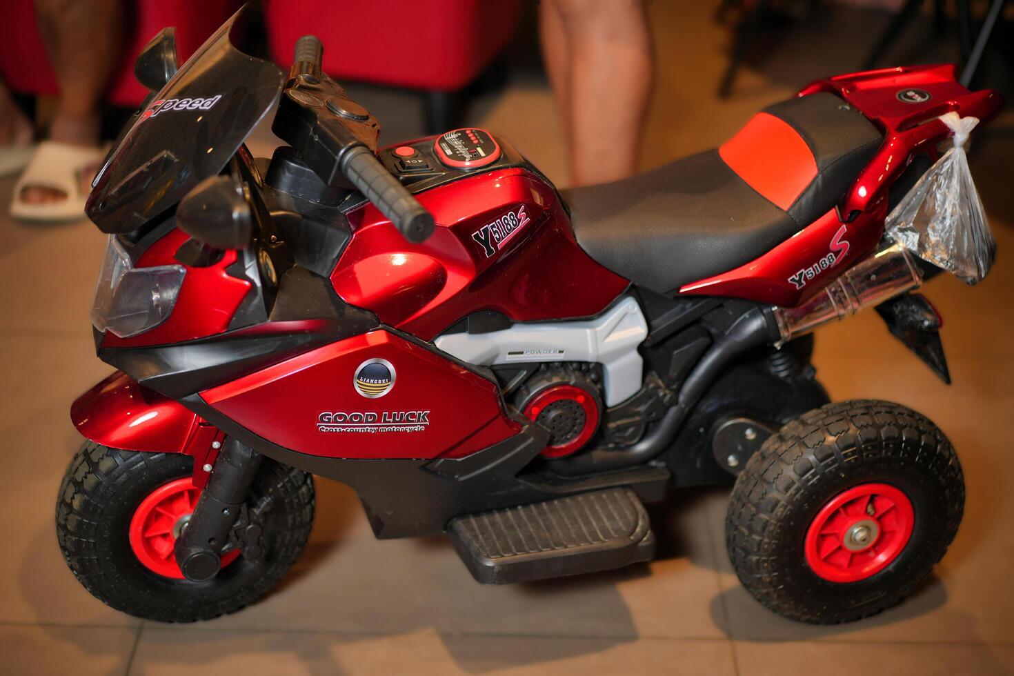 A red toy motorcycle photo