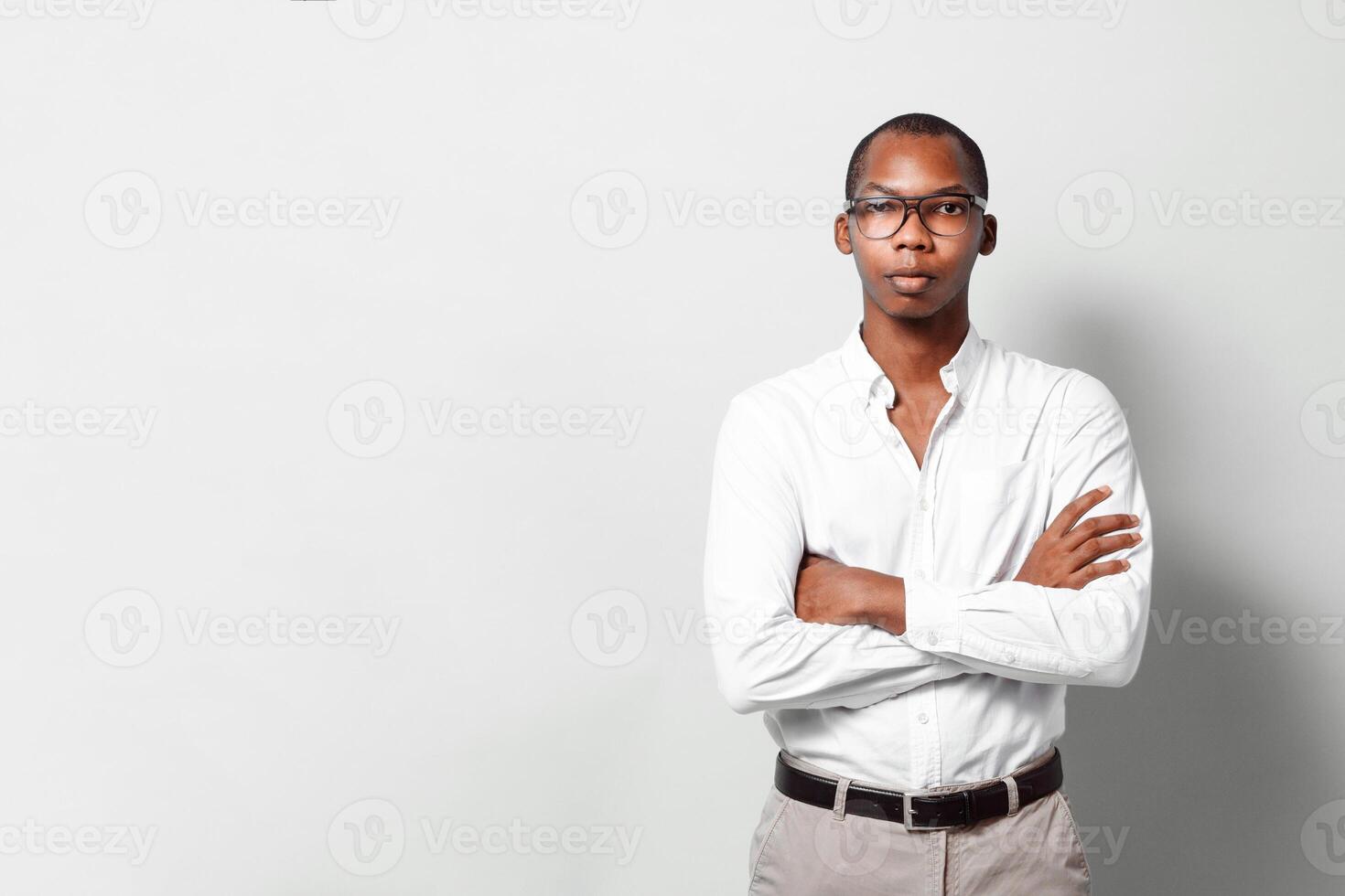 Portrait of a confident black business man looking at camera with copy space. photo