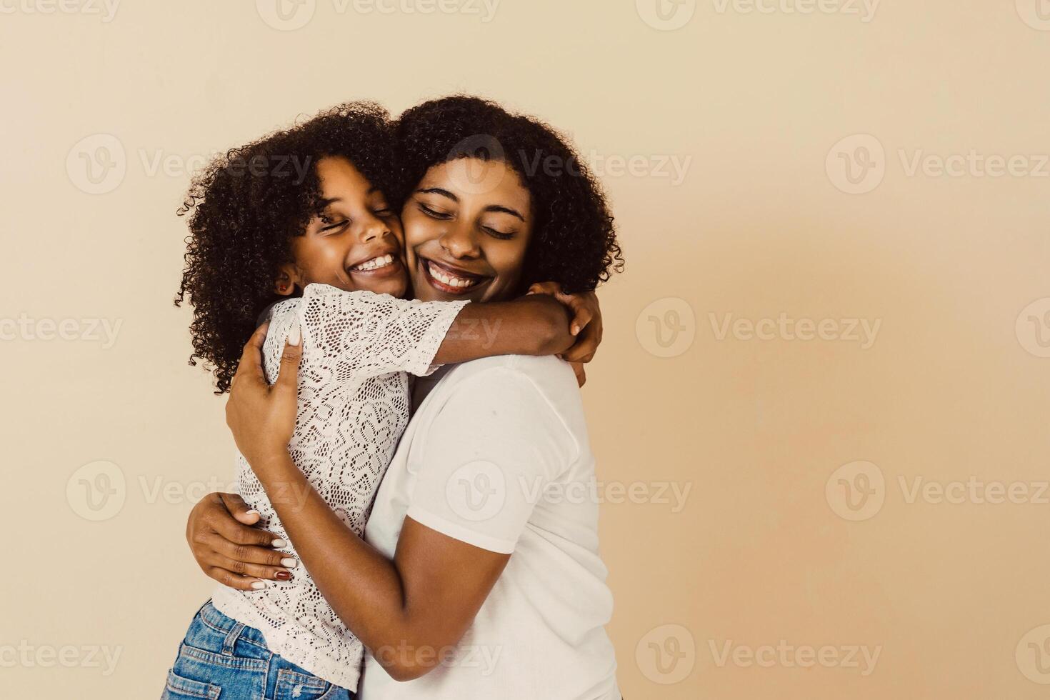 happy family of single mother and daughter together hugging. photo