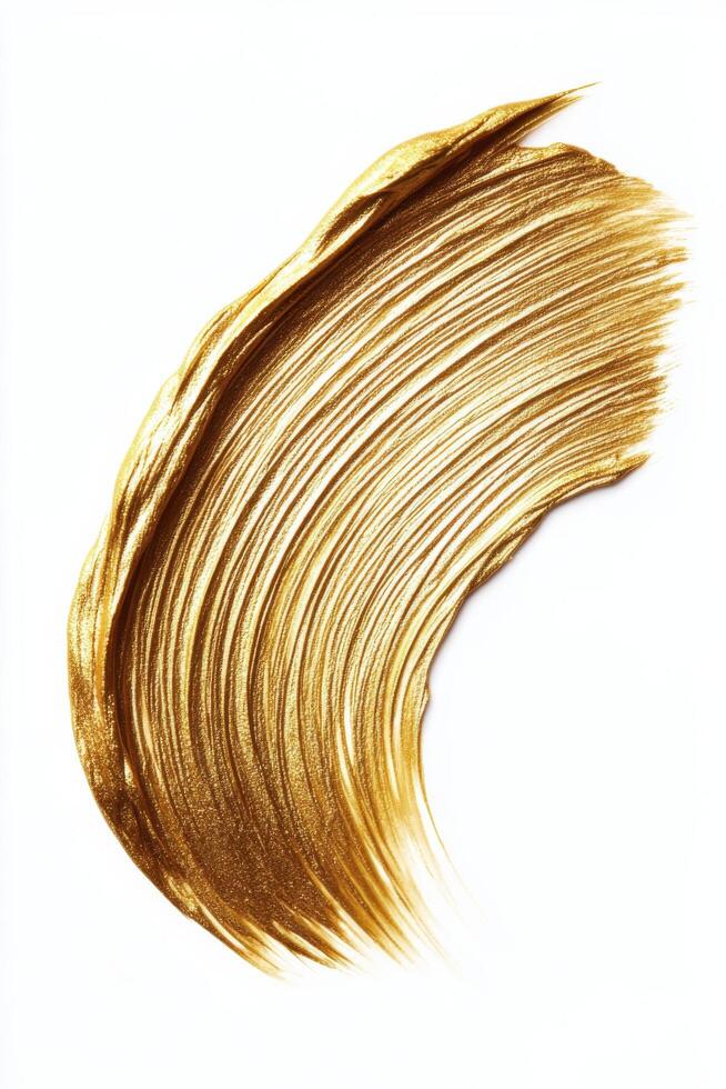 Elegant gold brush stroke with splatters on a clean white background for artistic design photo