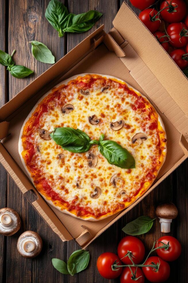 Delicious cheese pizza topped with mushrooms and fresh basil in a takeout box on wooden table photo