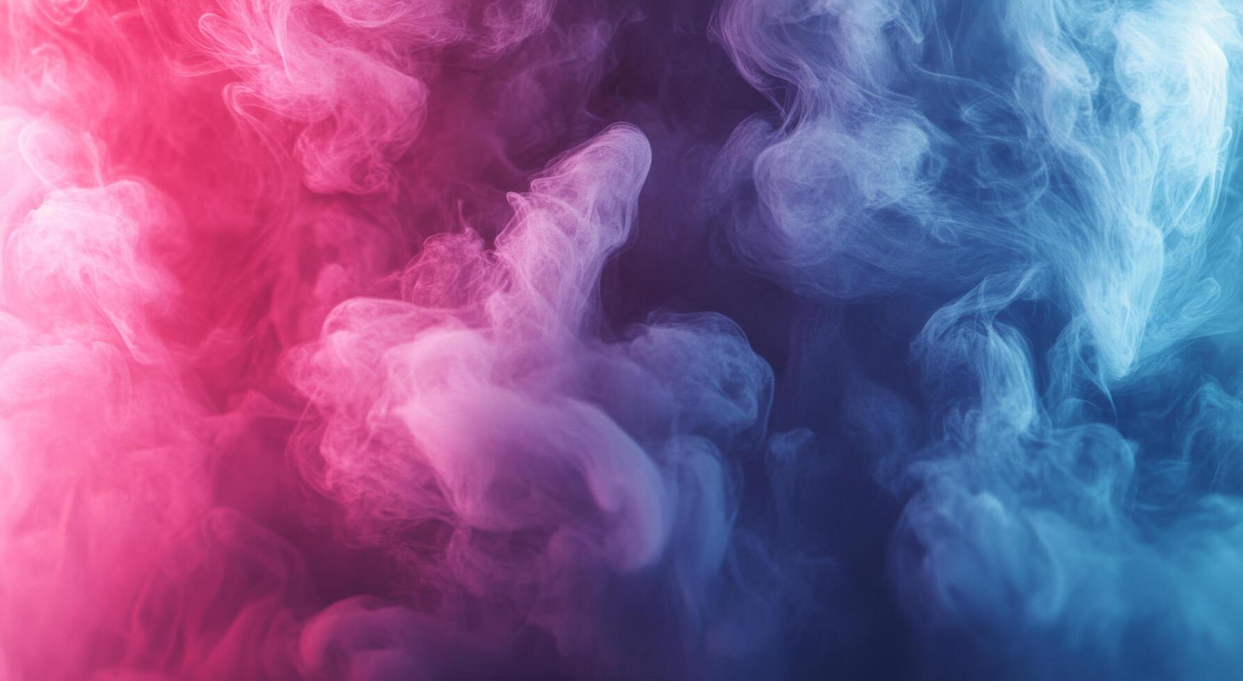 Colorful smoke patterns blend together in a mesmerizing display of orange and blue hues photo