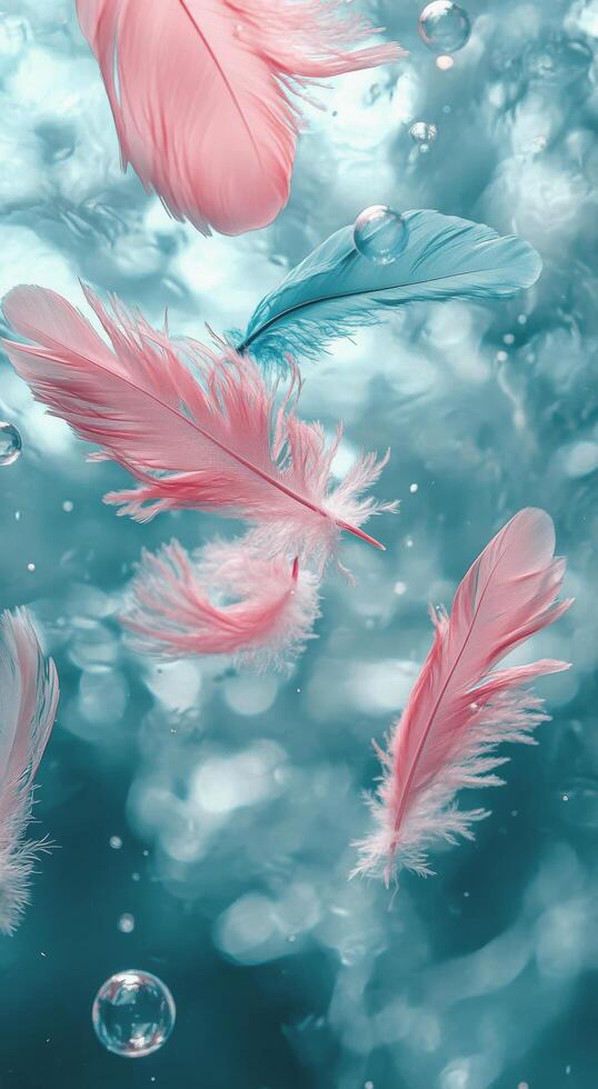 Delicate pink feathers gently float in a shimmering blue background with soft bubbles photo