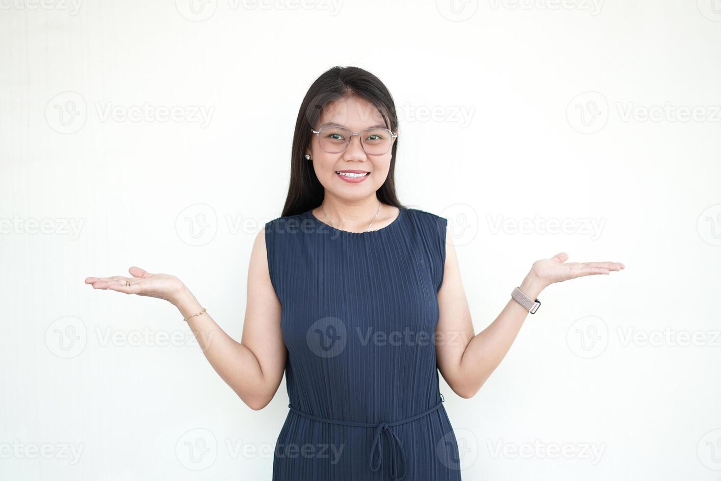 Beautiful Asian Woman Showing two product on empty palm Isolated On White Background photo