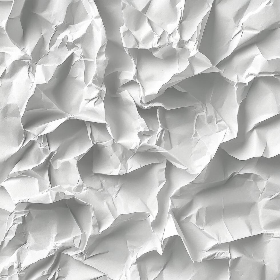 Crumpled white paper highlighting texture and folds in a minimalistic design concept photo