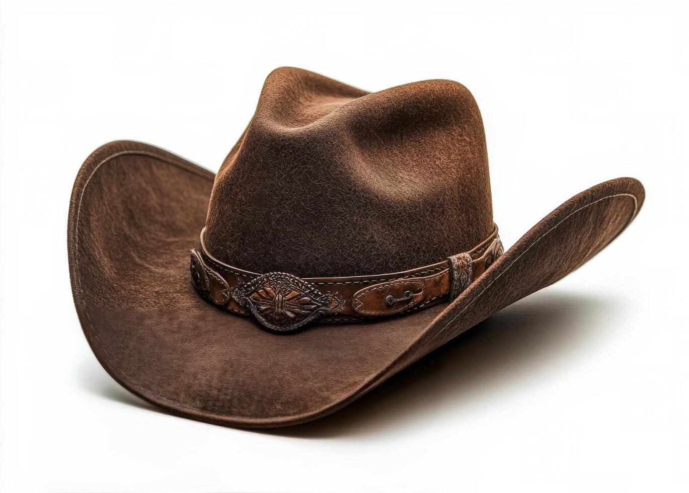 Classic brown cowboy hat resting on a clean white background for timeless style photo