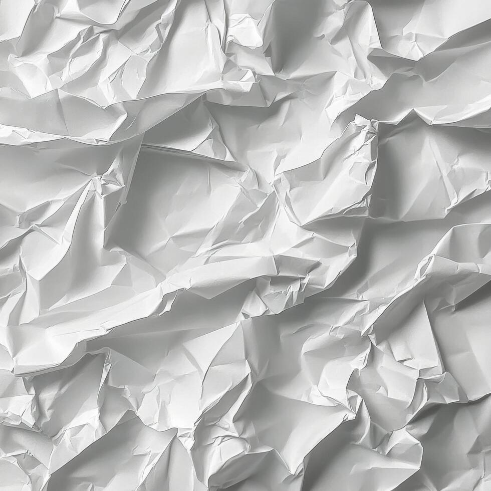 Crumpled white paper highlighting texture and folds in a minimalistic design concept photo