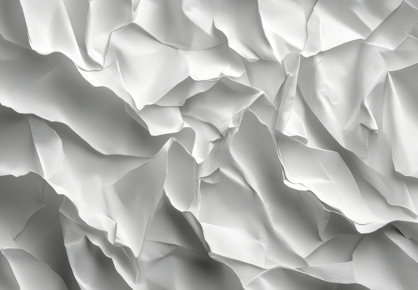 Textured white paper layers creating a delicate and intricate pattern in soft lighting photo