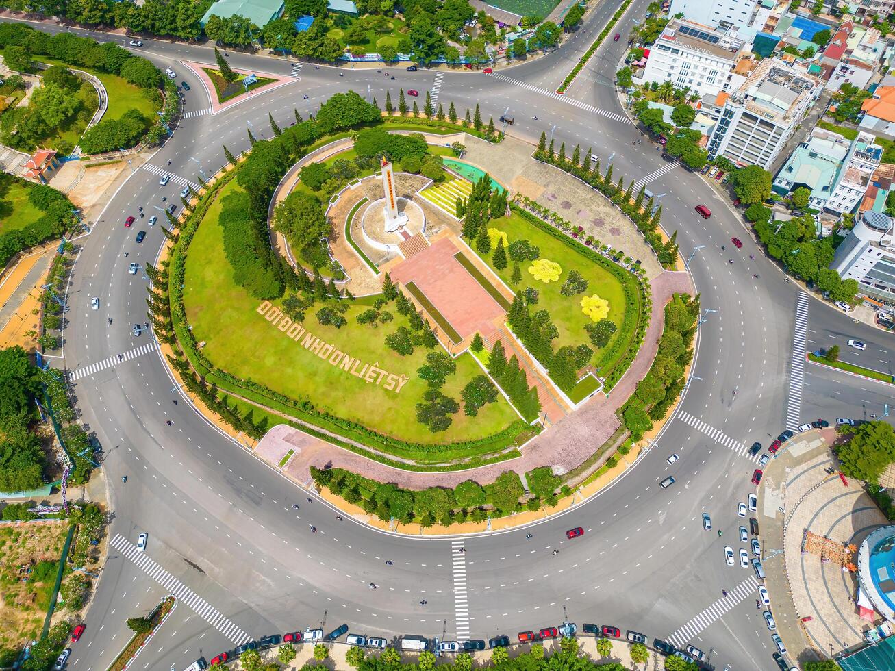 Vung Tau view from above, with traffic roundabout, house, Vietnam war memorial in Vietnam. This is the biggest roundabout in Vung Tau. photo