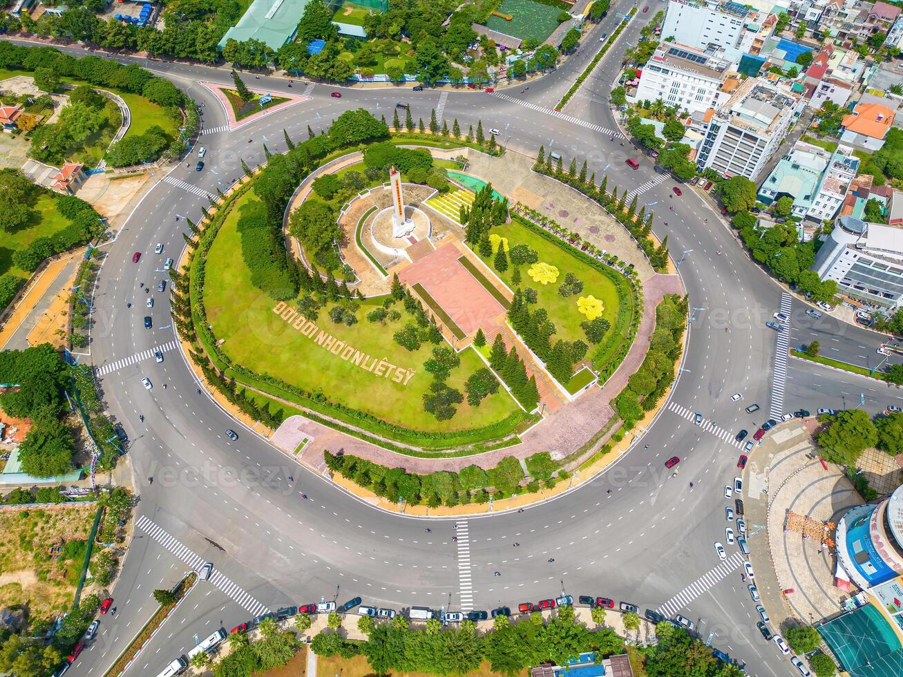 Vung Tau view from above, with traffic roundabout, house, Vietnam war memorial in Vietnam. This is the biggest roundabout in Vung Tau. photo