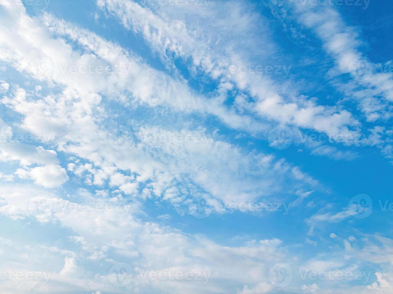 Beautiful view of blue sky with clouds at sunrise. Partly cloudy.Background cloud summer. Cloud summer. Sky cloud clear with sunset. Natural sky cinematic beautiful yellow and white texture background photo