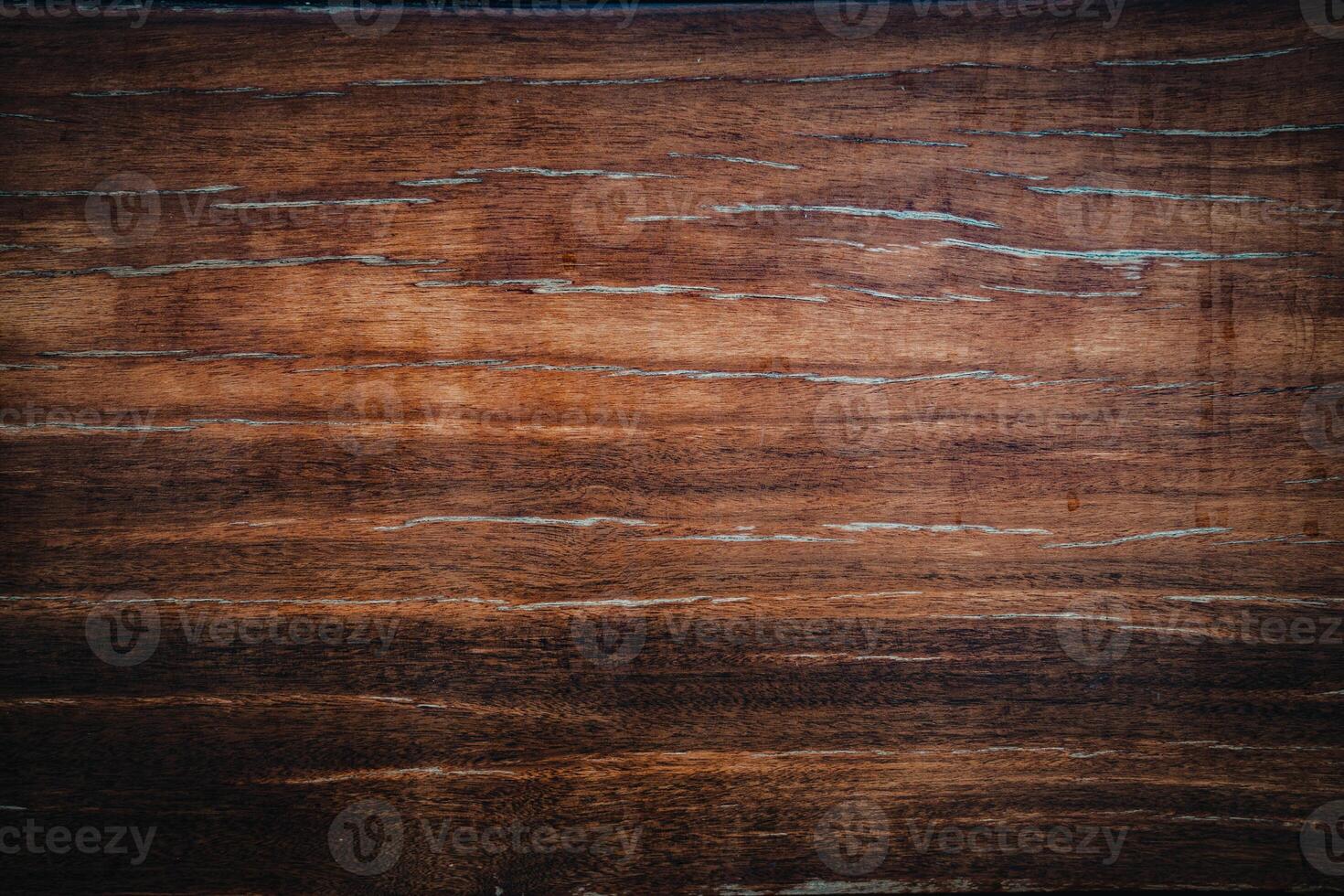 Dark wood texture background surface with old natural pattern. Walnut wood texture. Close up walnut planks texture background. photo