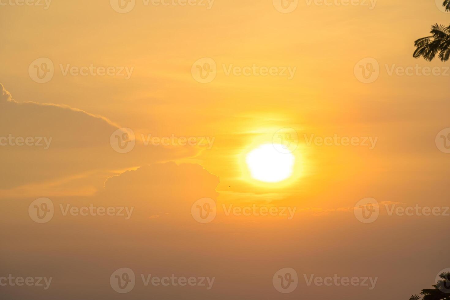 Calm sea with sunset sky and sun through the clouds over. Calm sea with sunset sky and sun through the clouds over. Meditation ocean and sky background. Tranquil seascape. Horizon over the water. photo