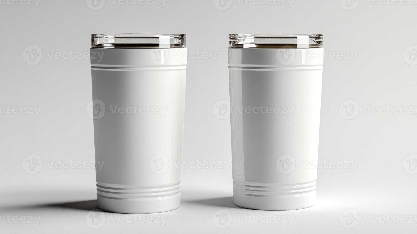 Two sleek white tumblers stand side by side, showcasing their smooth design photo