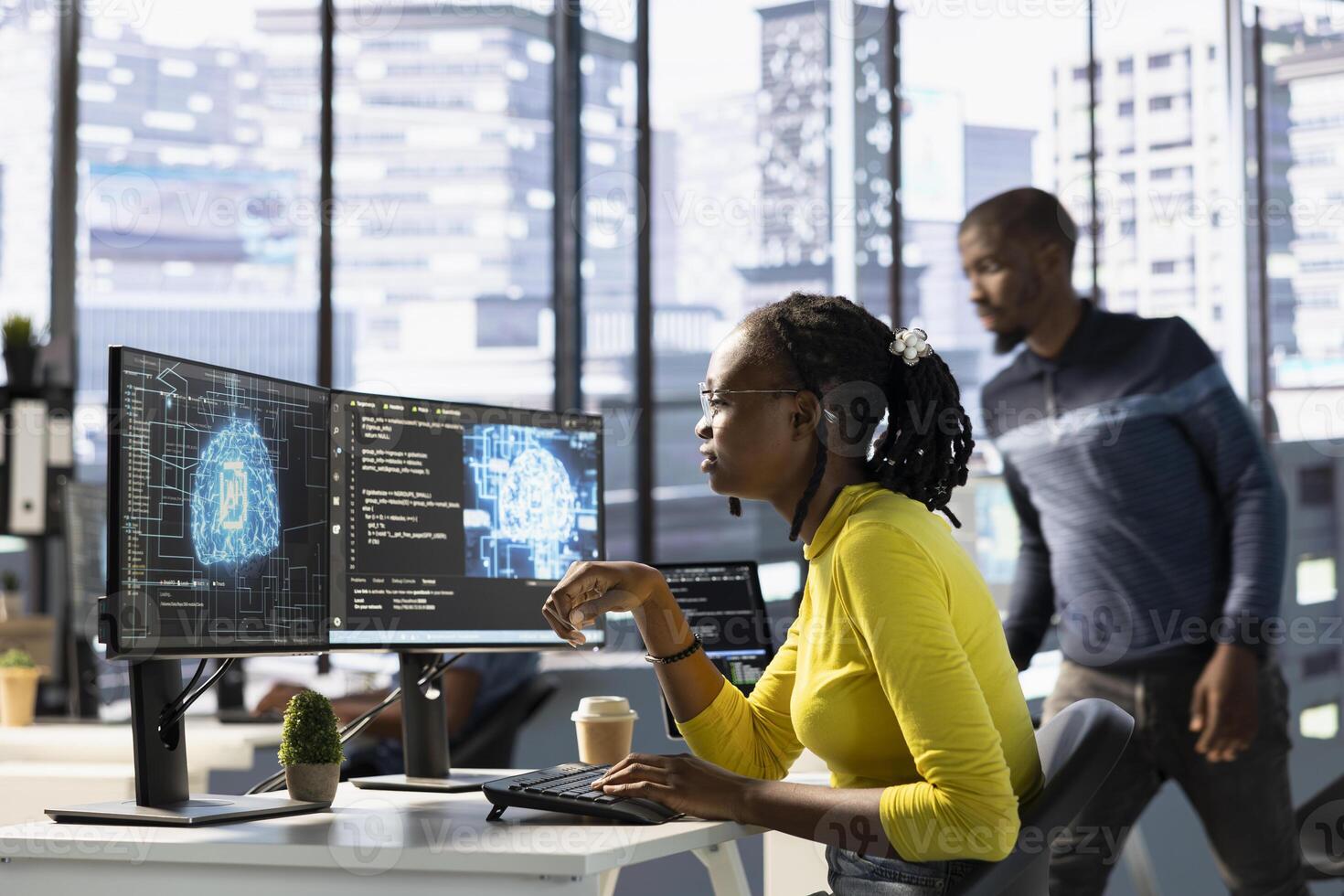 Computer scientist conducting experiments and tests to optimize machine learning models for performance and accuracy. African american IT expert in office analyzing and interpreting complex AI data photo