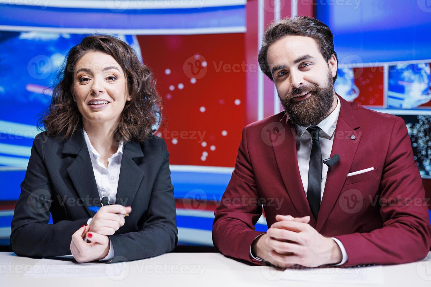 Broadcasters team present daily news live on television network, discussing about latest events on morning show. Media journalists reading important headlines of the day, create content. photo