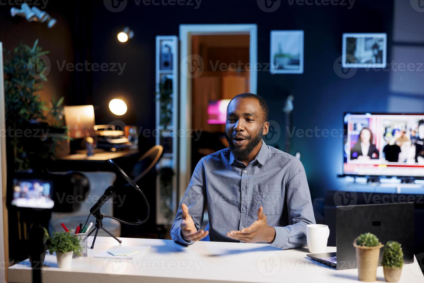 Content creator doing story time type of for audience, filming in personal home studio. Media star telling viewers about what happened to him last week, keeping audience engaged photo