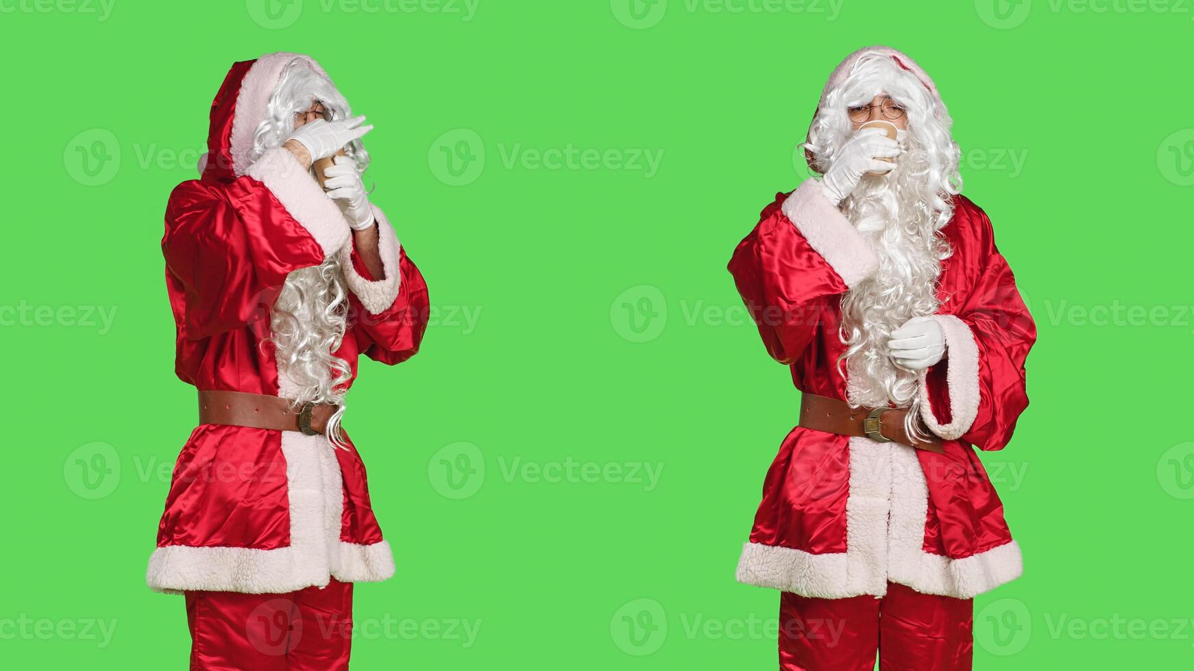 Saint nick character drinks coffee in studio, enjoying hot beverage in a cup while he portrays santa claus with white fake beard. Young adult dressed as father christmas, festive drink. photo